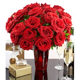  2 Dozen Red Roses in a Vase with box of chocolate.
