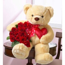 A Cute Teddy bear With Roses